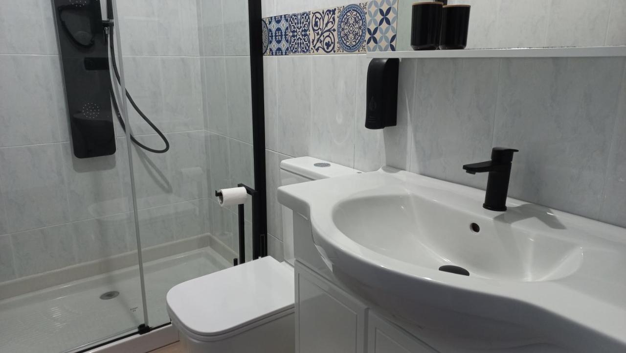 Appartamento Lar Abeancos Melide Esterno foto