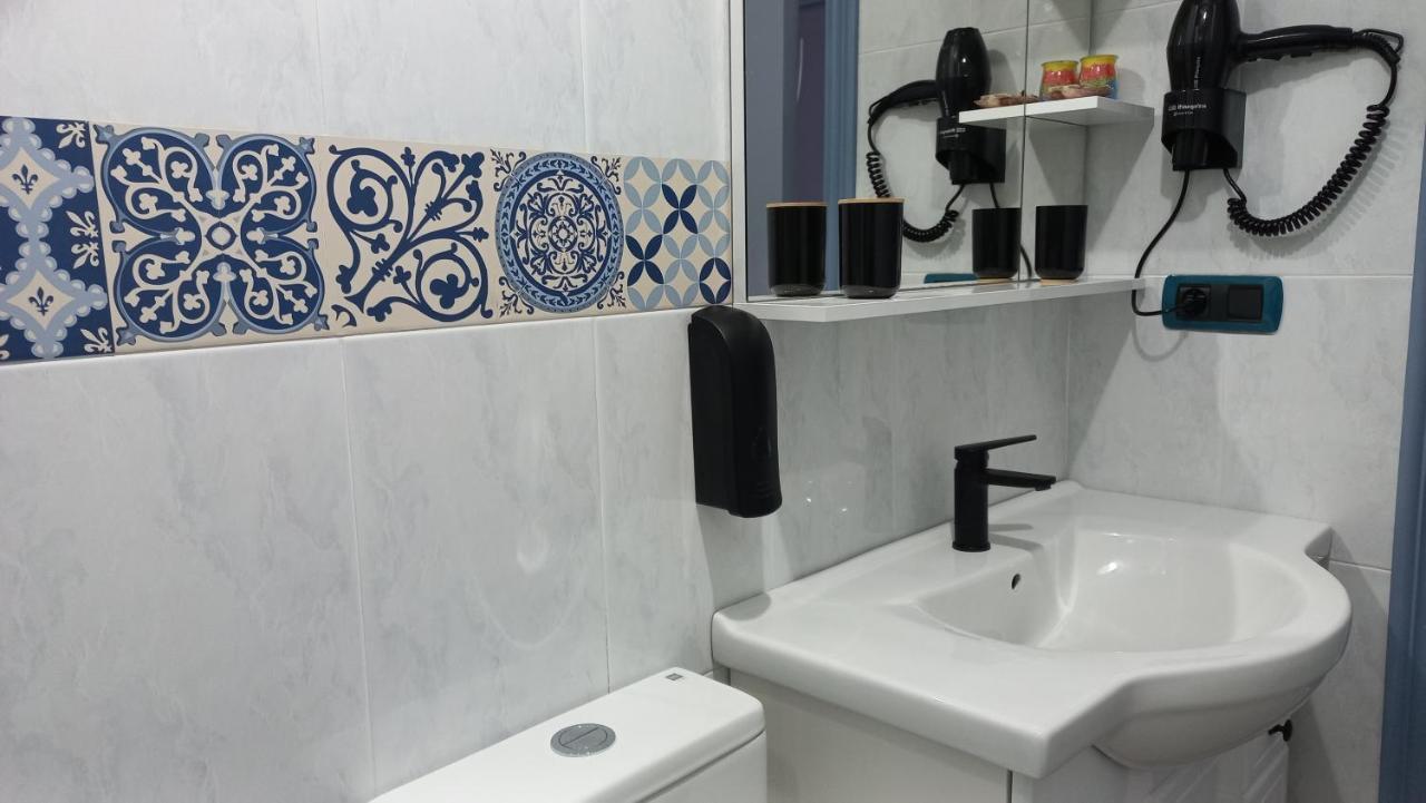 Appartamento Lar Abeancos Melide Esterno foto